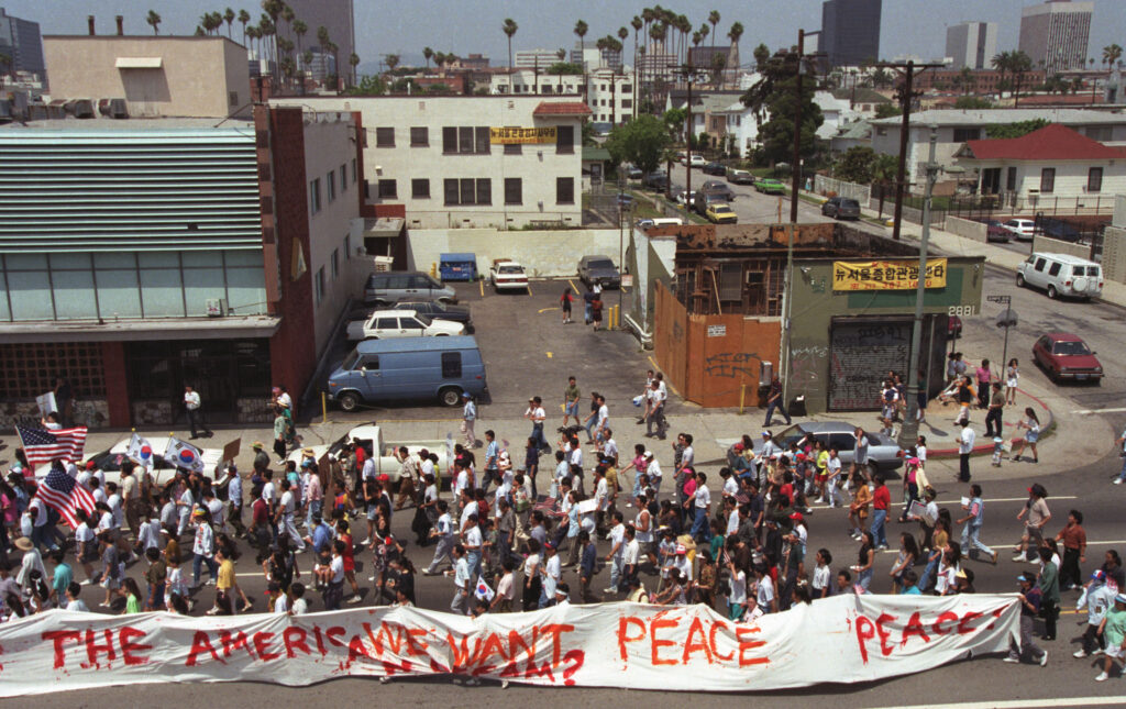 People march calling for peace in Koreatown, Los Angeles